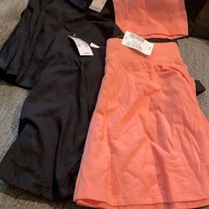 Two black skirts one is salmon rose. Purchased them from the children’s Place.